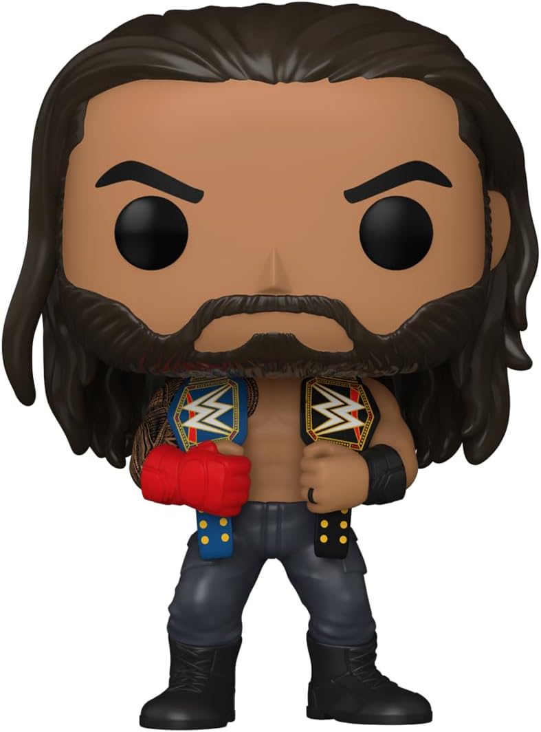 WWE wrestler figurine with championship belts 