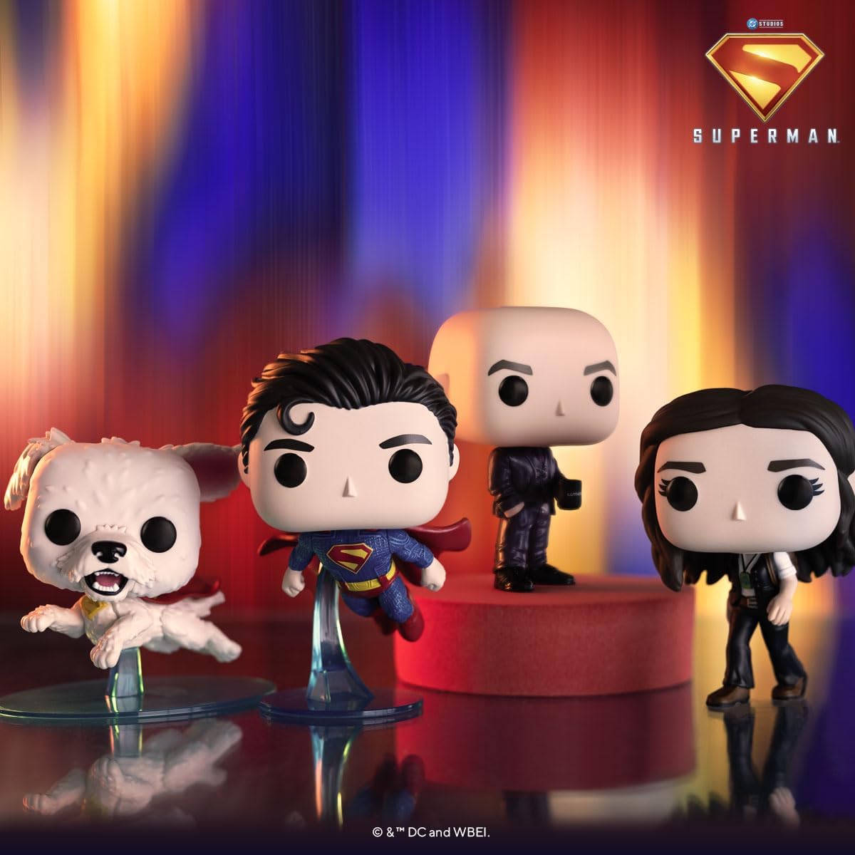 Superman-themed figurines on a colorful background with Superman logo.