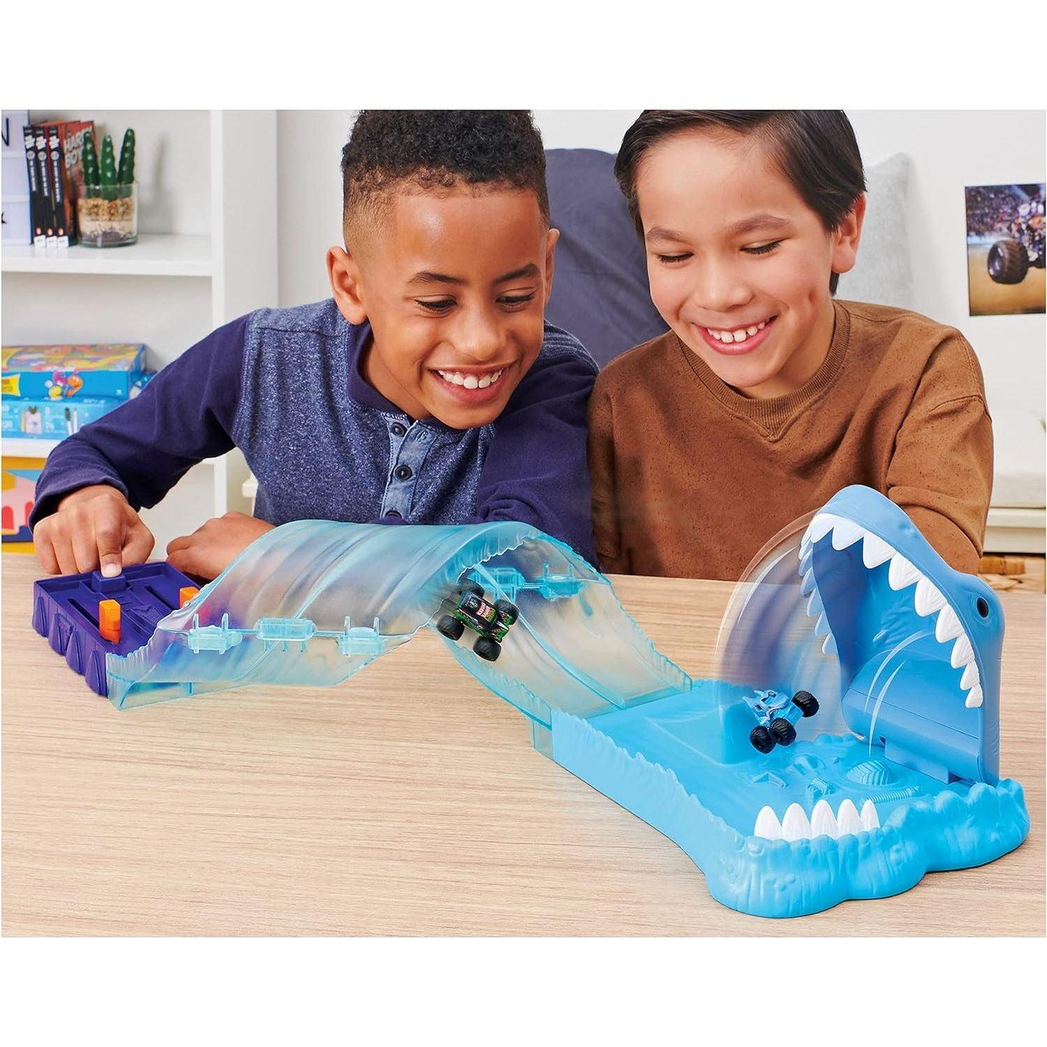 Spin Master Monster Jam, Mini Megalodon Race and Chomp Playset with 2 Monster Jam Mini Trucks, 1;87 Scale