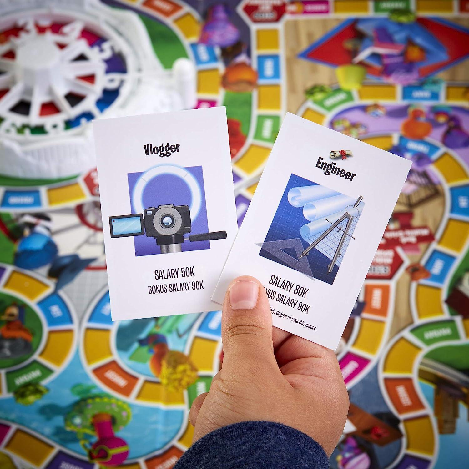 Hasbro Gaming The Game of Life Game, Family Board Game for 2-4 Players, Indoor Game for Kids Ages 8 and Up, Pegs Come in 6 Colors - BumbleToys - 8-13 Years, Boys, Card & Board Games, Girls, Puzzle & Board & Card Games