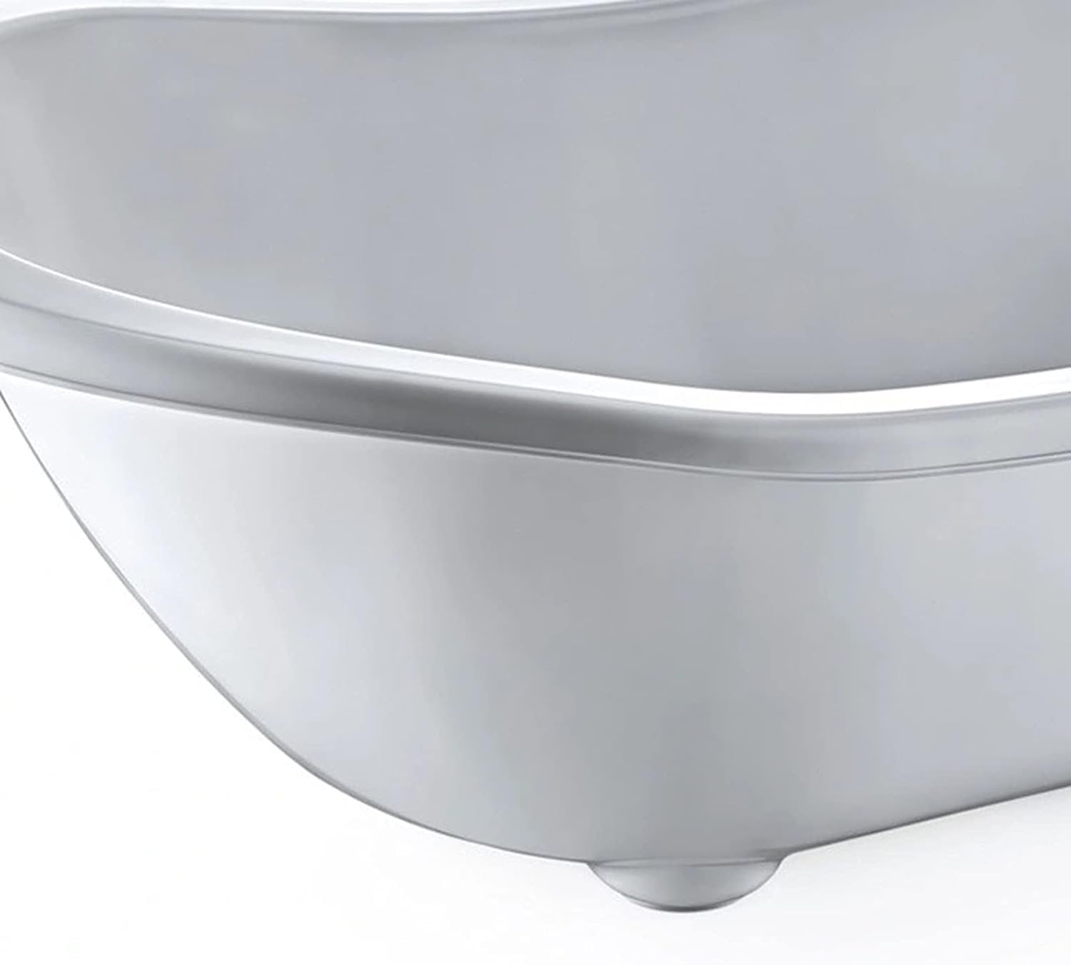 Close-up of a white ceramic sink basin 