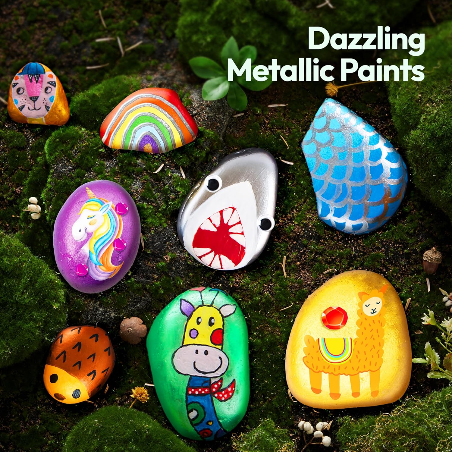 Colorful painted rocks with animal designs on a green moss background, labeled 'Dazzling Metallic Paints'.
