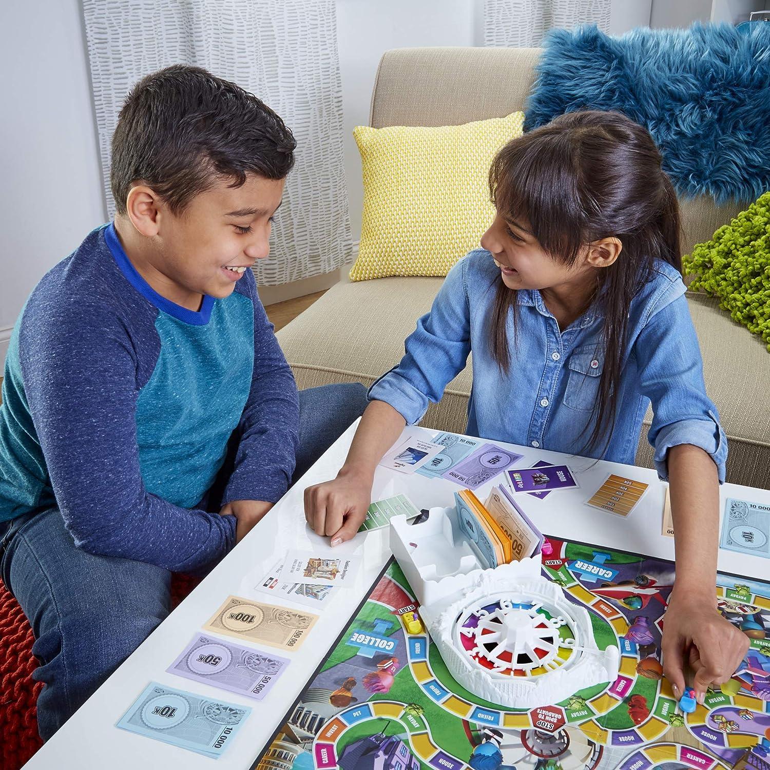 Hasbro Gaming The Game of Life Game, Family Board Game for 2-4 Players, Indoor Game for Kids Ages 8 and Up, Pegs Come in 6 Colors - BumbleToys - 8-13 Years, Boys, Card & Board Games, Girls, Puzzle & Board & Card Games