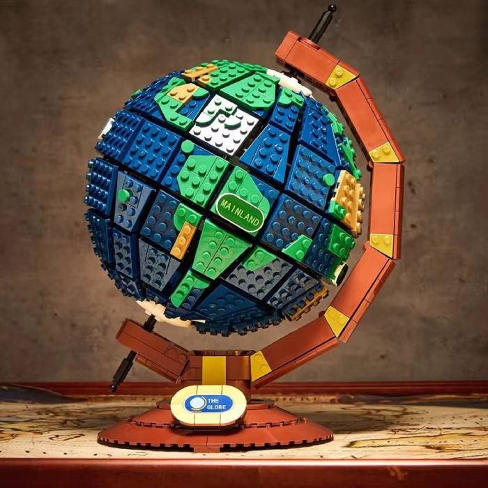 Globe made of interlocking bricks on a wooden surface 