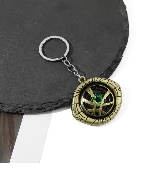 سلسلة مفاتيح من مارفل دكتور سترينج على شكل عين دوارة عتيقة وحامل مفاتيح