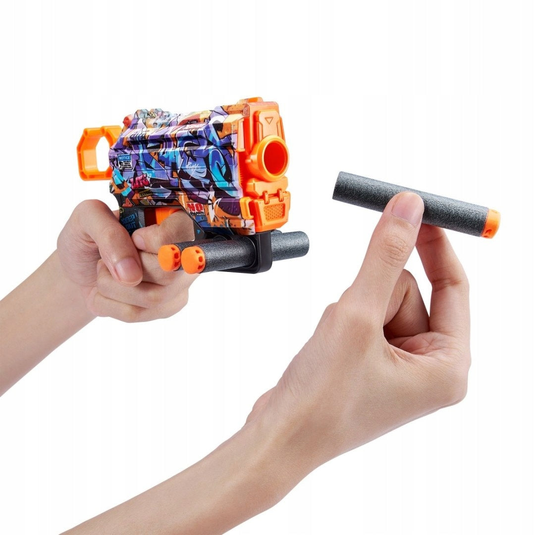 ZURU X-SHOT Small pistol launcher SKINS MENACE With 8 bullets - Spray Tag